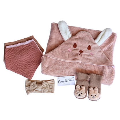 This an image of bunny baby towel gift set including a hooded baby towel, soft socks, muslin bib set and a baby headband