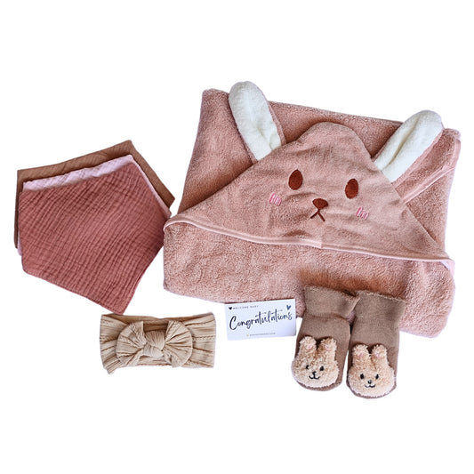 This an image of bunny baby towel gift set including a hooded baby towel, soft socks, muslin bib set and a baby headband